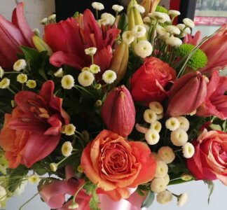 Lillies and roses in vase